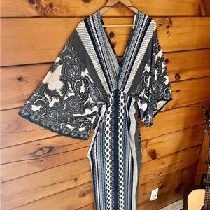 This dress is a absolute a dream. It truly fits in anywhere and is timeless